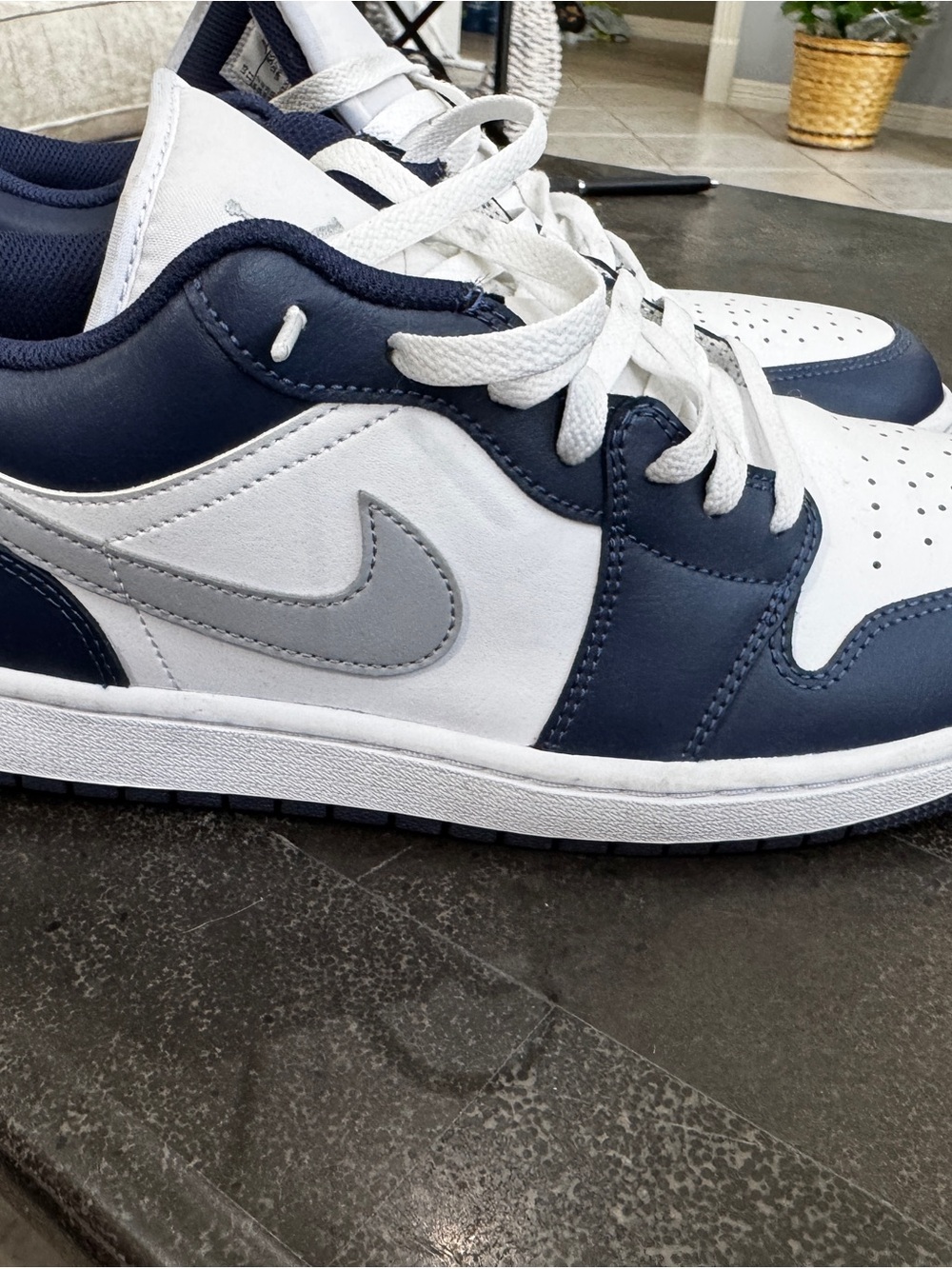Men’s size 11 Nike Air Jordan 1 Low in the "Midnight Navy" Gray Swoosh